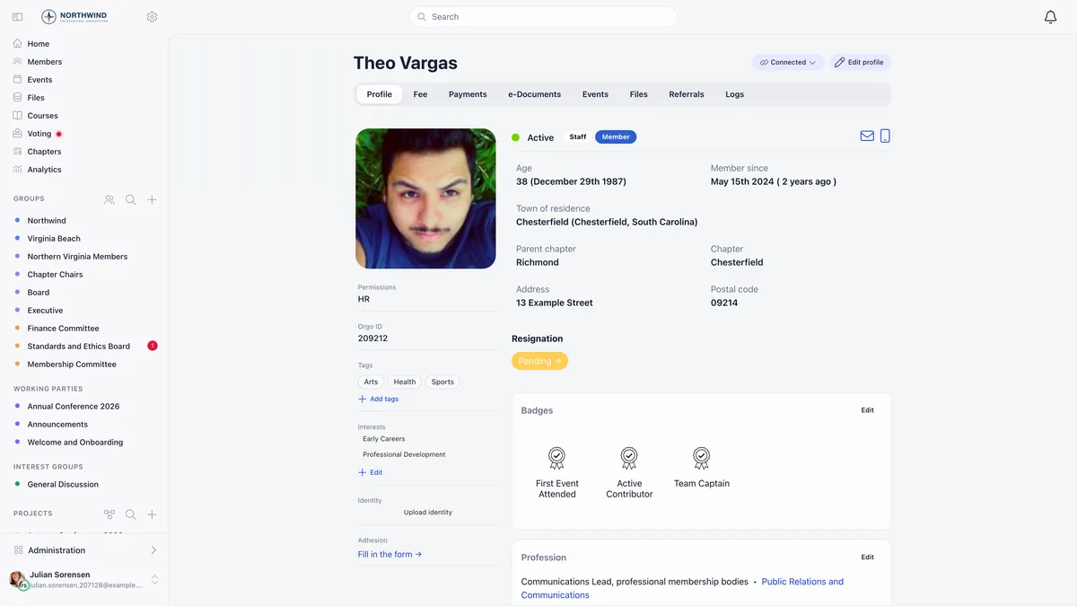 A member profile for Theo Vargas open on the Profile tab, with a green Active badge, age, member since, town of residence, parent chapter and chapter, and a left column carrying permissions, Orgo ID, the tags Arts, Health and Sports, an Interests section listing Early Careers and Professional Development, an identity upload prompt and an adhesion link