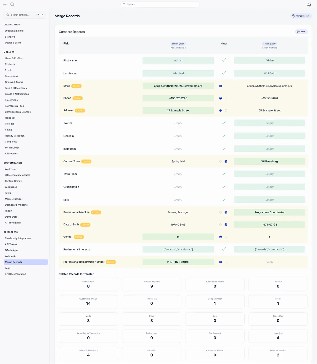 Merge comparison table with a Field column and Source and Target columns for two records both named Adrian Whitfield, where matching rows such as First Name and Last Name carry a green tick, and Email, Phone, Address, Current Town, Professional headline, Date of Birth, Gender and Professional Registration Number carry an orange Conflict tag with a pair of radio buttons, above a Related Records to Transfer panel counting Event Attend 8, Product Payment 9, Custom Field Value 14, Company User 1, Invoice 1, Media 3, Drive 3, User Role 4, User Unit Role Group 4 and Form Submission 2